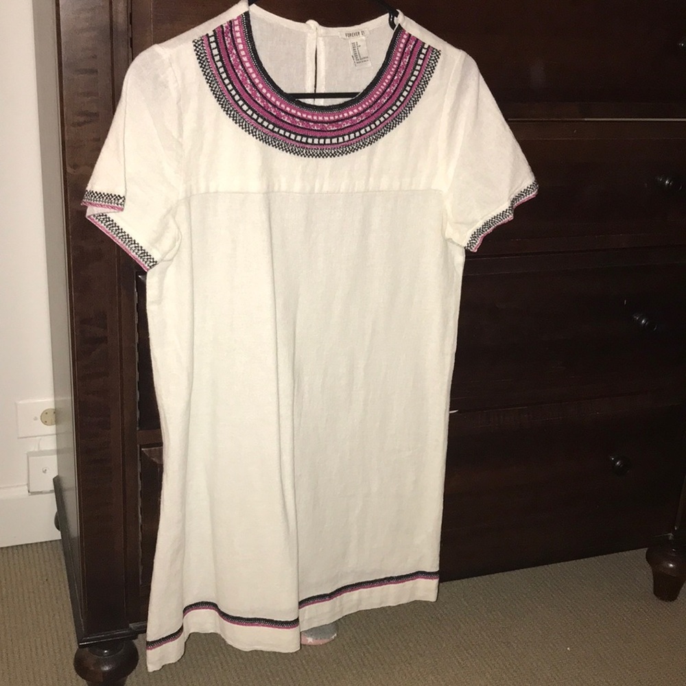 Cream linen dress with embroidered detail